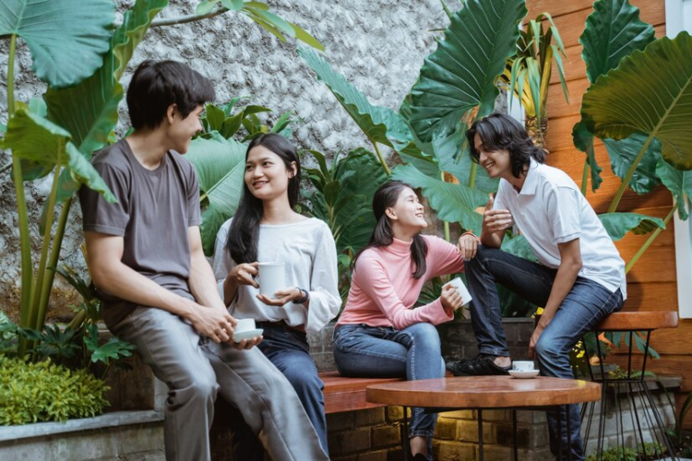 A group of people sitting on a bench