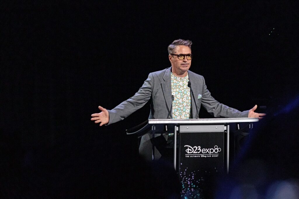 robert downey jr addiction: Robert Downey Jr. on stage at the 2019 Disney Legends Awards Ceremony, speaking at a podium about his journey to recovery.