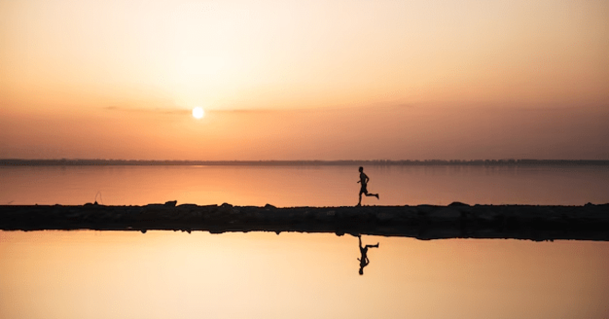 A sunrise over a serene landscape representing gratitude and new opportunities.