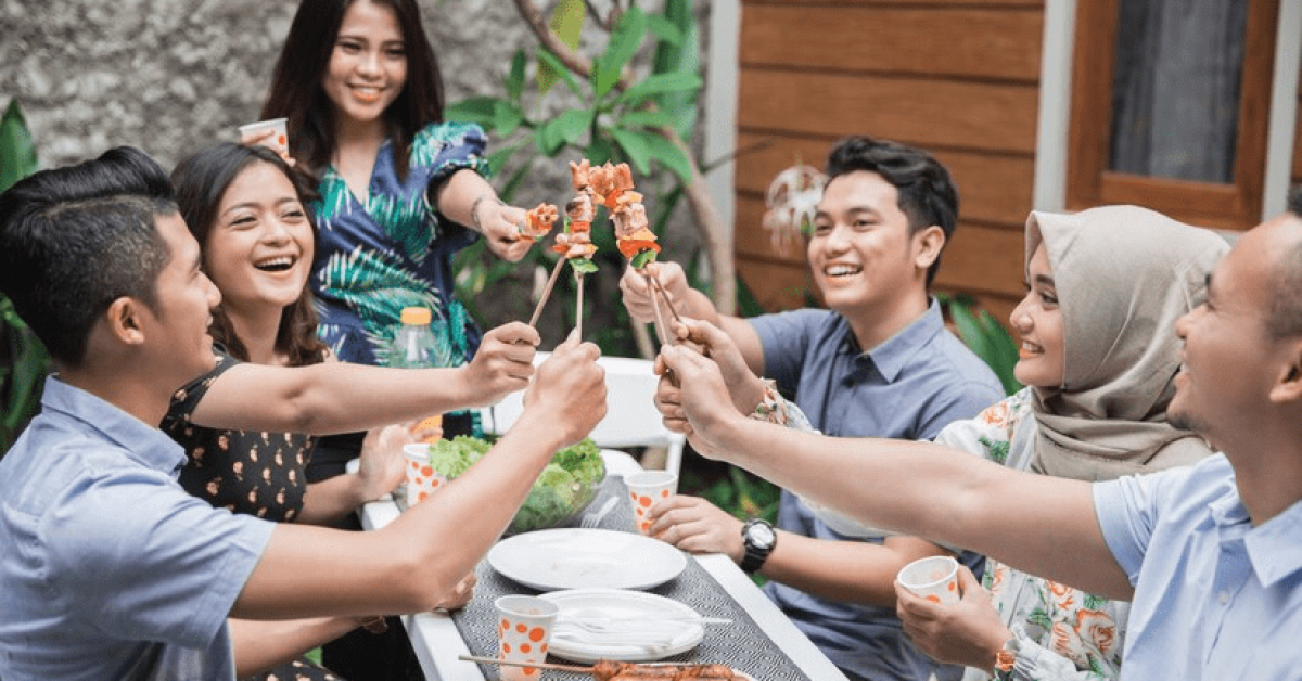 A group of people eating food
