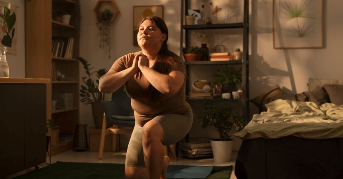 A person doing yoga in a room