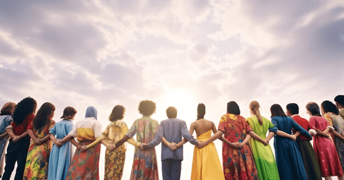 A diverse group of women standing together, advocating for gender equality and empowerment during International Women’s History Month 2025.
