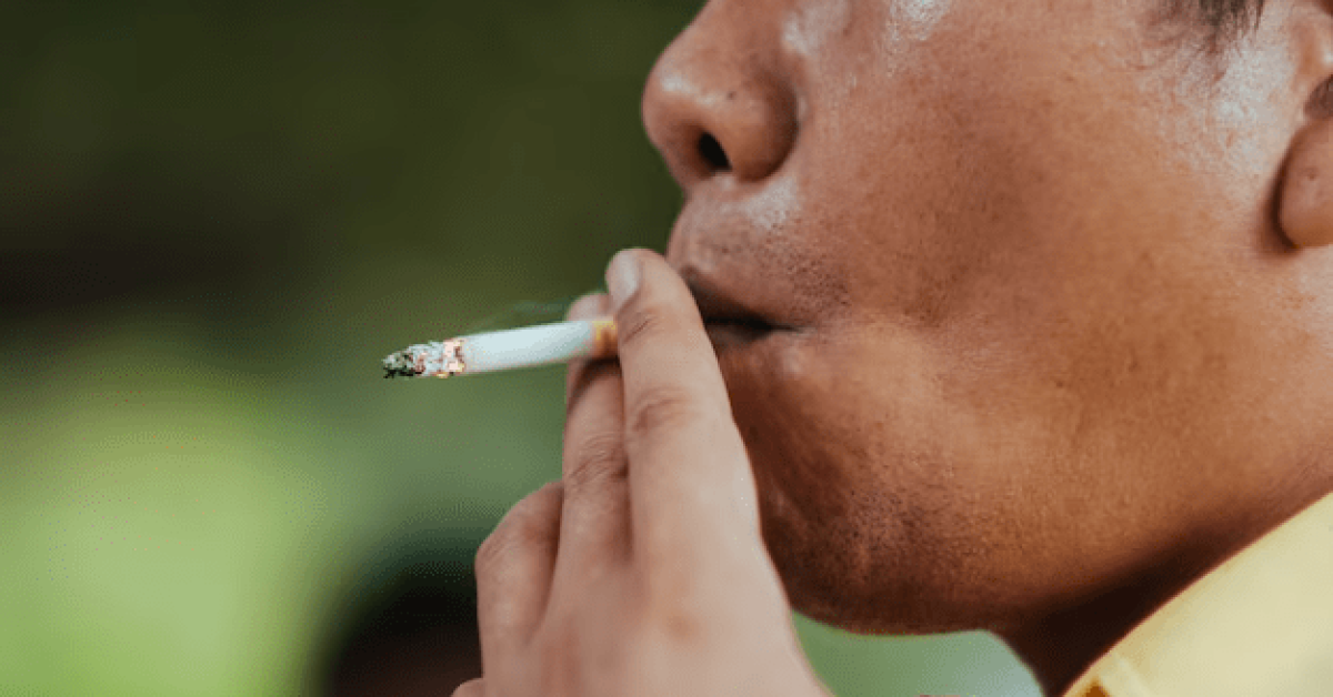 A person smoking a cigarette